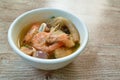 Boiled shrimp and dolly fish with mussel in Thai spicy tom yum soup on bowl Royalty Free Stock Photo