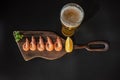 Boiled shrimp and a glass of beer. Shrimp and lemon. Lager beer and snacks. Royalty Free Stock Photo