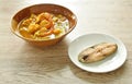 boiled shrimp and mixed vegetable in spicy and sour curry soup couple chop fried salty dry Indo-Pacific king mackerel fish Royalty Free Stock Photo