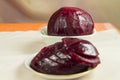 Boiled sliced beets on a saucer. Concept of healthy nutrition