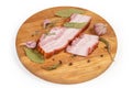 Boiled smoked pork belly and spices on wooden cutting board