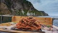 Boiled snow crabs are stacked in a slide on the stern of the yacht.