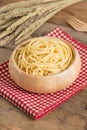 Boiled spaghetti in wood bowl. Royalty Free Stock Photo