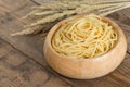 Boiled spaghetti in wood bowl. Royalty Free Stock Photo