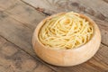 Boiled spaghetti in wood bowl. Royalty Free Stock Photo