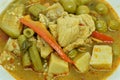 Boiled spicy mixed vegetable with chicken in curry soup on bowl