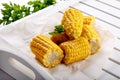 Boiled sweet corn cob with butter and salt Royalty Free Stock Photo