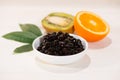 Boiled Tapioca Pearls with kiwi and orange on wooden background.