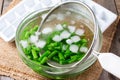 Boiled vegetables, green beans in ice water after blanching