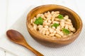 Boiled white beans in wooden bowl. Photo Royalty Free Stock Photo