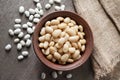 Boiled white kidney beans in a rustic bowl