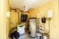 Boiler room and heating system in the cottage. Gas and electric boilers, voltage stabilization system