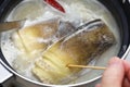 Boiling bamboo shoots to remove the bitter taste. Royalty Free Stock Photo