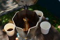 Boiling coffee by Moka pot Royalty Free Stock Photo