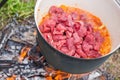 Boiling, hot goulash soup with meat, paprika, potatoes, onion, carrots is the traditional dish of Hungarian cuisine Royalty Free Stock Photo