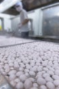 Boiling pork meat balls in hot pot with blur background Royalty Free Stock Photo