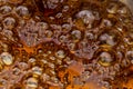 Boiling sugar with bubbles turns into caramel, caramelization