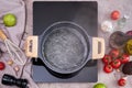 Boiling water in a cooking pot an a pan on a induction stove at domestic kitchen Royalty Free Stock Photo