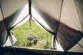 Boiling water in kettle on portable camping stove Royalty Free Stock Photo