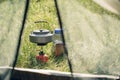 Boiling water in kettle on portable camping stove Royalty Free Stock Photo