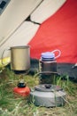 Boiling water in kettle on portable camping stove Royalty Free Stock Photo