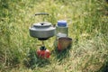 Boiling water in kettle on portable camping stove Royalty Free Stock Photo