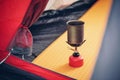 Boiling water in kettle on portable camping stove Royalty Free Stock Photo