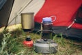 Boiling water in kettle on portable camping stove Royalty Free Stock Photo