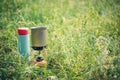 Boiling water in kettle on portable camping stove Royalty Free Stock Photo