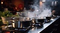 Boiling water in the pot on the stove in a modern kitchen, Water Boiling on a Gas Stove, Stainless pot Royalty Free Stock Photo