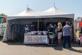 Shoppers look for clothing at the Lularoe multi-level marketing booth at the Western Idaho State