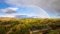 Boise Idaho neighborhood skyline with double rainbow after rain during Summer. View from Camels Back Park Royalty Free Stock Photo