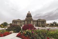 Idaho State Capitol Building with bright flowers and cloudy sky Royalty Free Stock Photo