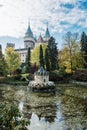 Bojnice castle with beautiful turret reflected in the lake, Slovak republic, seasonal scene Royalty Free Stock Photo