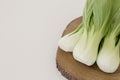 Bok choy chinese cabbage in a wooden board