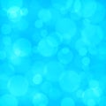 Bokeh abstract background, blue defocused texture for Christmas greeting card Royalty Free Stock Photo