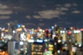 Bokeh abstract background of skyscraper buildings in Bangkok city, Thailand with lights, Blurry photo at night time. Cityscape Royalty Free Stock Photo