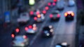 Bokeh abstract blurred background festive traffic yellow orange green red lights on road with sparkling circular animate motion 3D