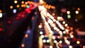 Bokeh abstract blurred background festive traffic yellow orange green red lights on road with sparkling circular animate motion 3D