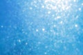 Bokeh Abstract Texture. Beautiful Christmas Background In Light Blue Colors. Defocused