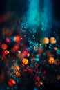 Bokeh background with bright glowing lights and water droplets Royalty Free Stock Photo