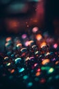 Bokeh background with bright glowing lights and water droplets Royalty Free Stock Photo