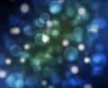 Bokeh background with Christmas lights. Light and dark blue tint