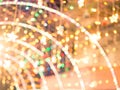 Bokeh background of colorful festive light turnel at night time