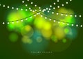 Bokeh background with outdoor string lights. Party glowing light bulbs background. Royalty Free Stock Photo