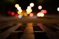Bokeh background with traffic lights in the background. Sink in the foreground. Royalty Free Stock Photo