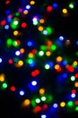 Bokeh of blurred Christmas lights - all colours - green, blue, orange, white, red Royalty Free Stock Photo