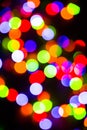 Bokeh of blurred Christmas lights - all colours - green, blue, orange, white, red Royalty Free Stock Photo