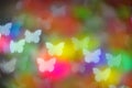 Bokeh colored butterfly lights on black background Royalty Free Stock Photo