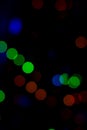 Bokeh of colored round festive Christmas lights